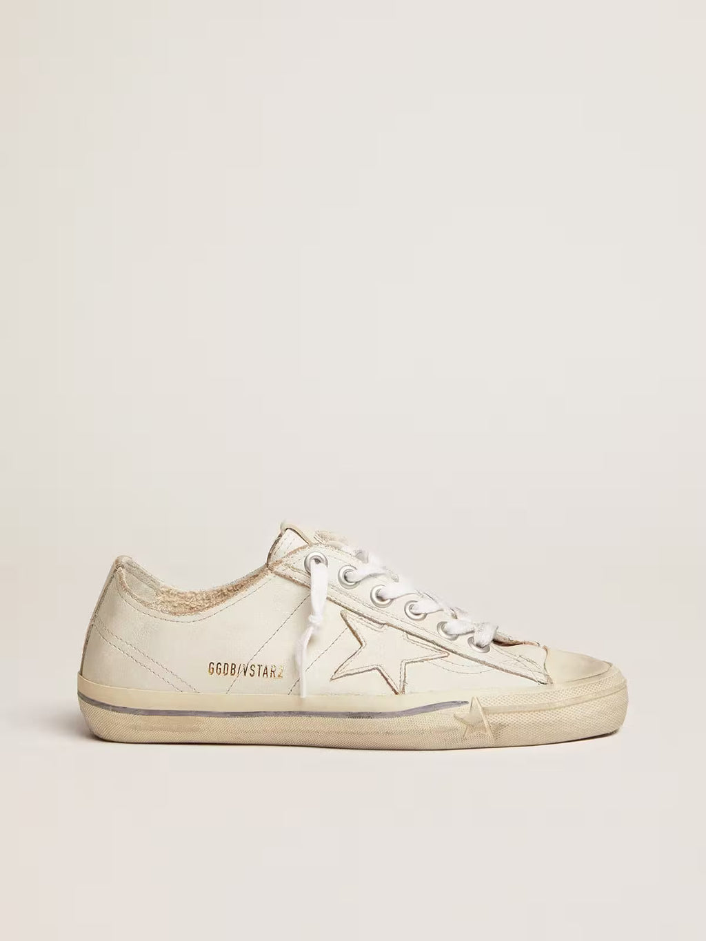 Golden Goose V-Star in white leather with white star and light blue stripe on the foxing