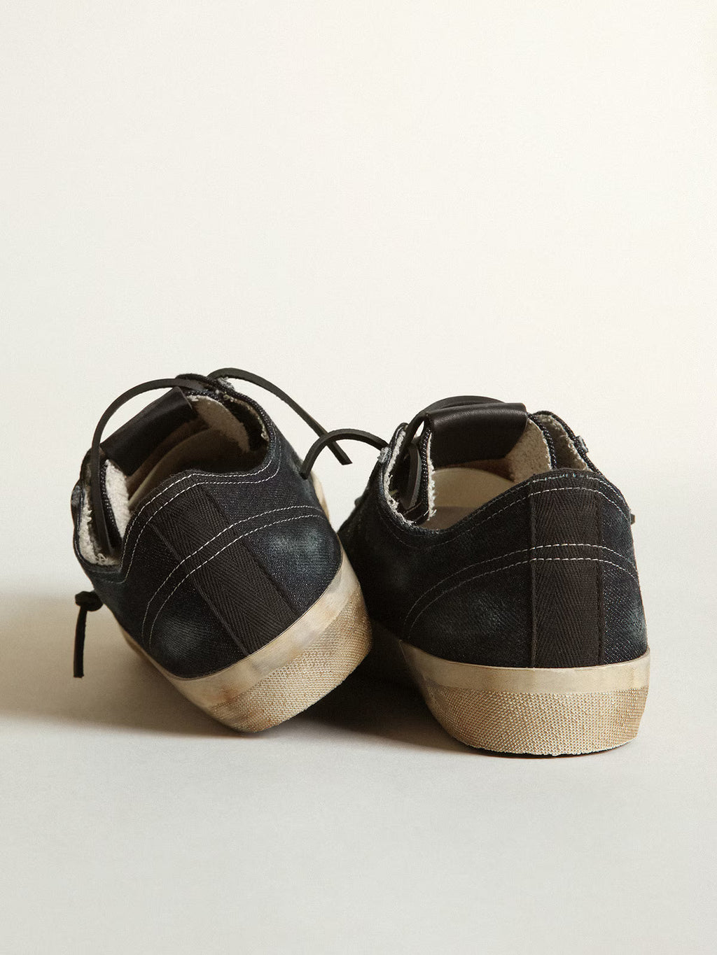 Golden Goose V-Star sneakers in midnight-blue denim with black leather star and toe