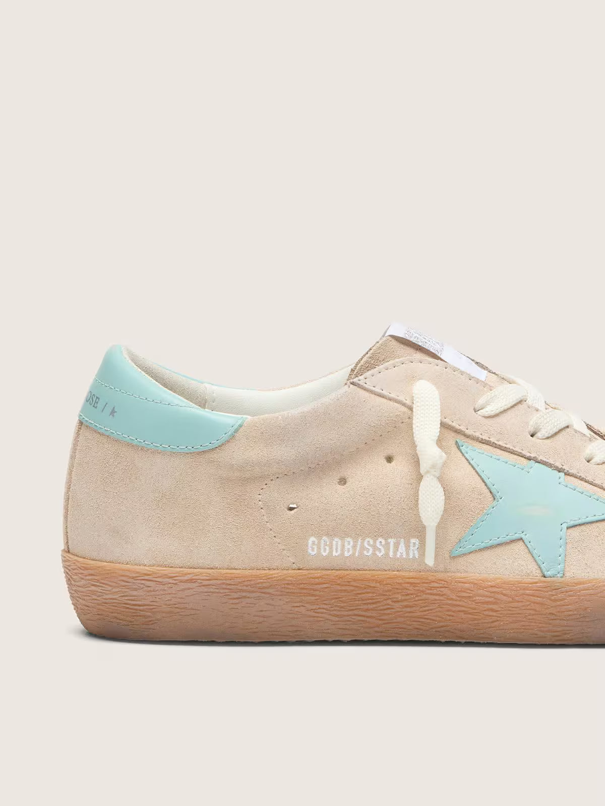 Golden Goose Super-Star in beige suede with aqua-green star
