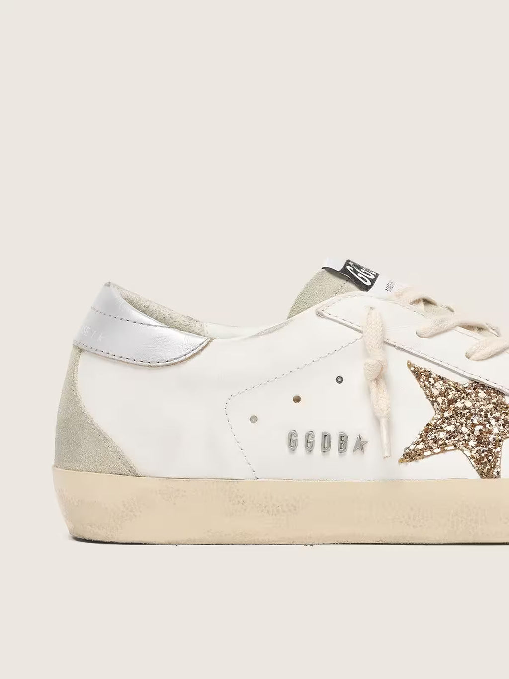 Golden Goose Super-Star with gold glitter star and ice-gray suede inserts